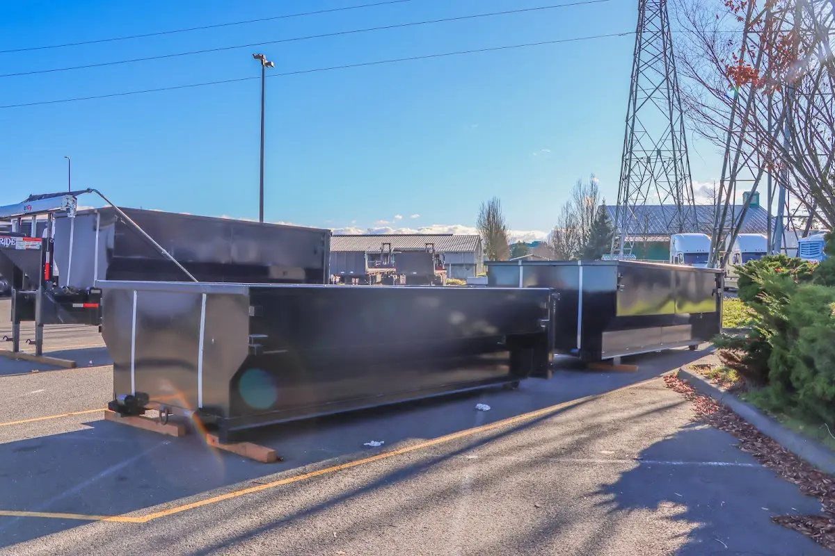 Roll-off dumpster ready for waste disposal at job site for 15 Yard Dumpster Rental in Orange City